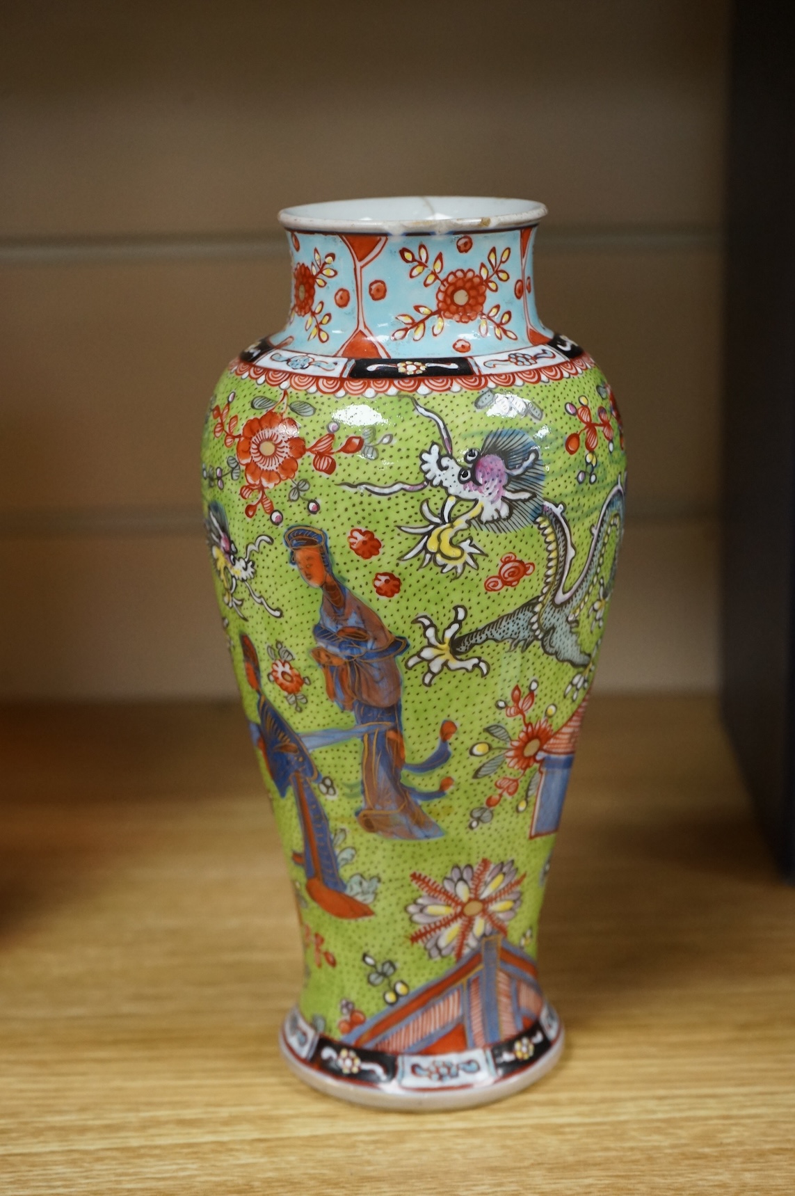 An 18th century Chinese clobbered vase, 20cm high